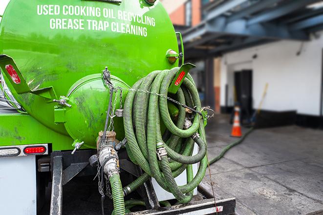 a service truck pumping grease from a restaurant's grease trap in Lumberton, NJ